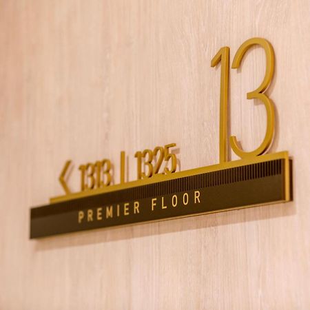 Amora Hotel Brisbane Bagian luar foto Floor sign of the 13th floor of the hotel