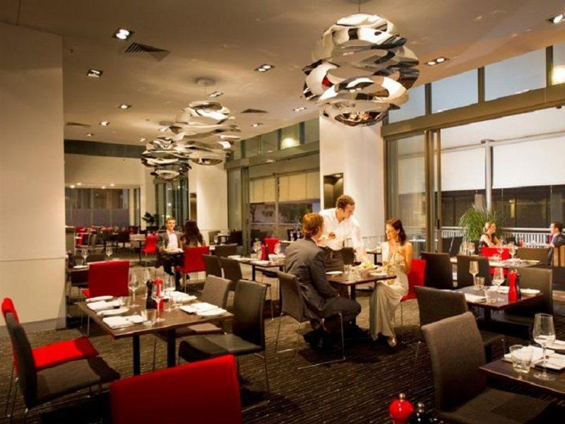 Amora Hotel Brisbane Bagian luar foto The interior of the restaurant